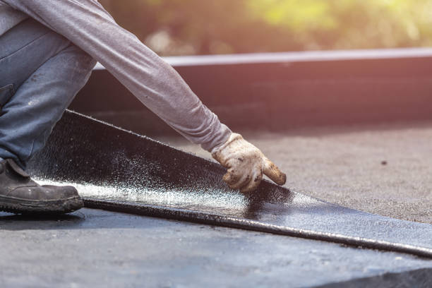 Professional Emergency Waterproofing technician working in Hampton, IL